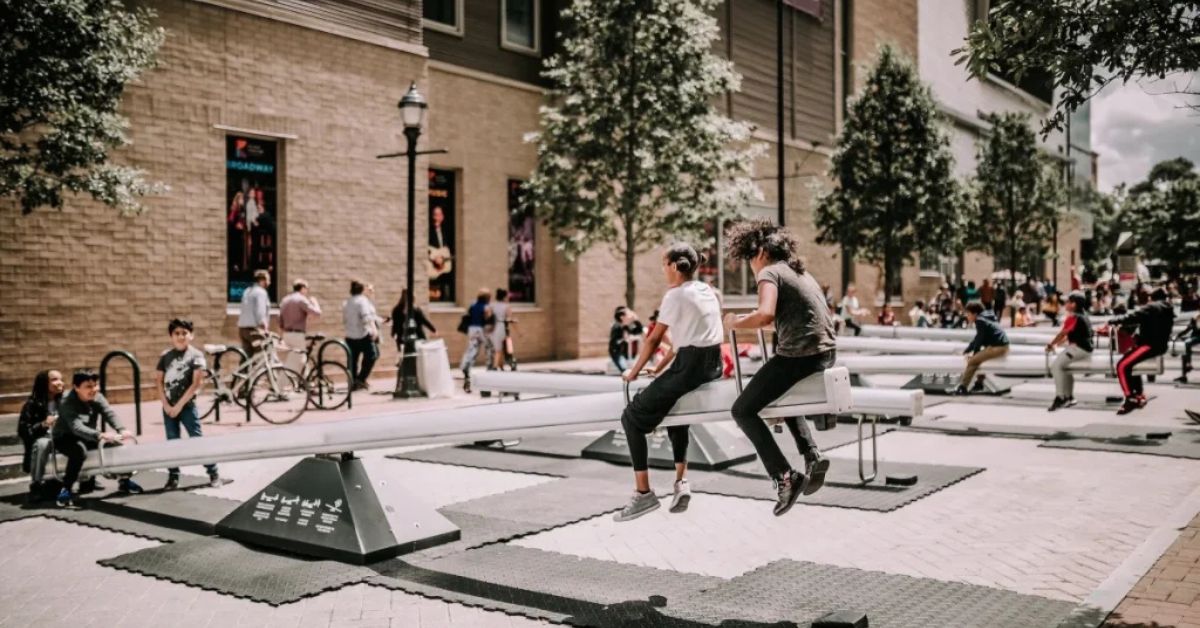 Giant Glowing Seesaws Are Lighting Up Herald Square This Summer – And They're Completely Free